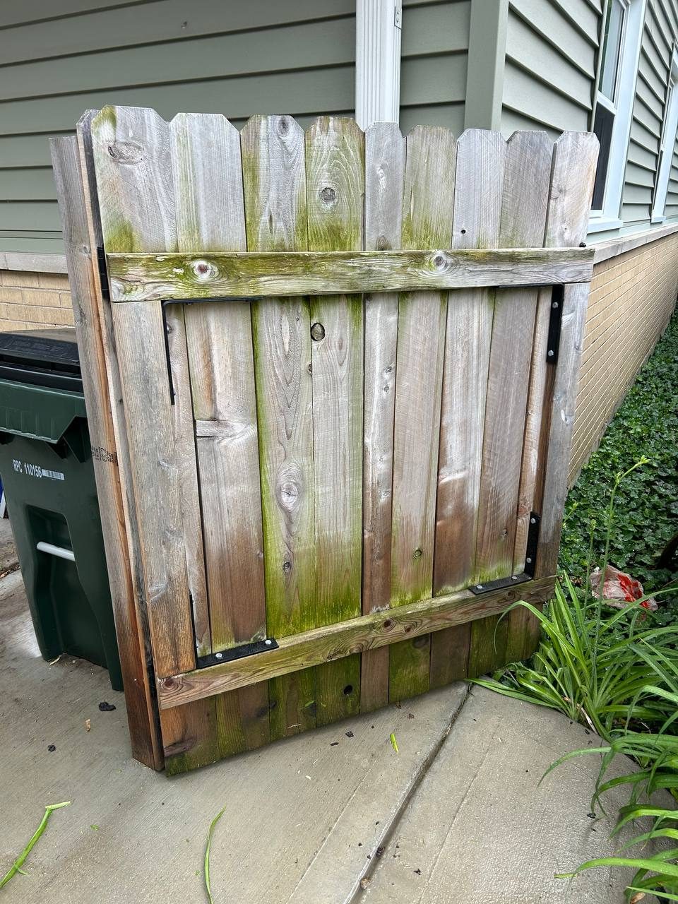 Wood fence gate before